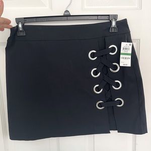 Black mini skirt with tie detailing